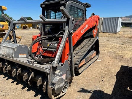 SVL 97.2 Kubota Skid Steer with Attachment